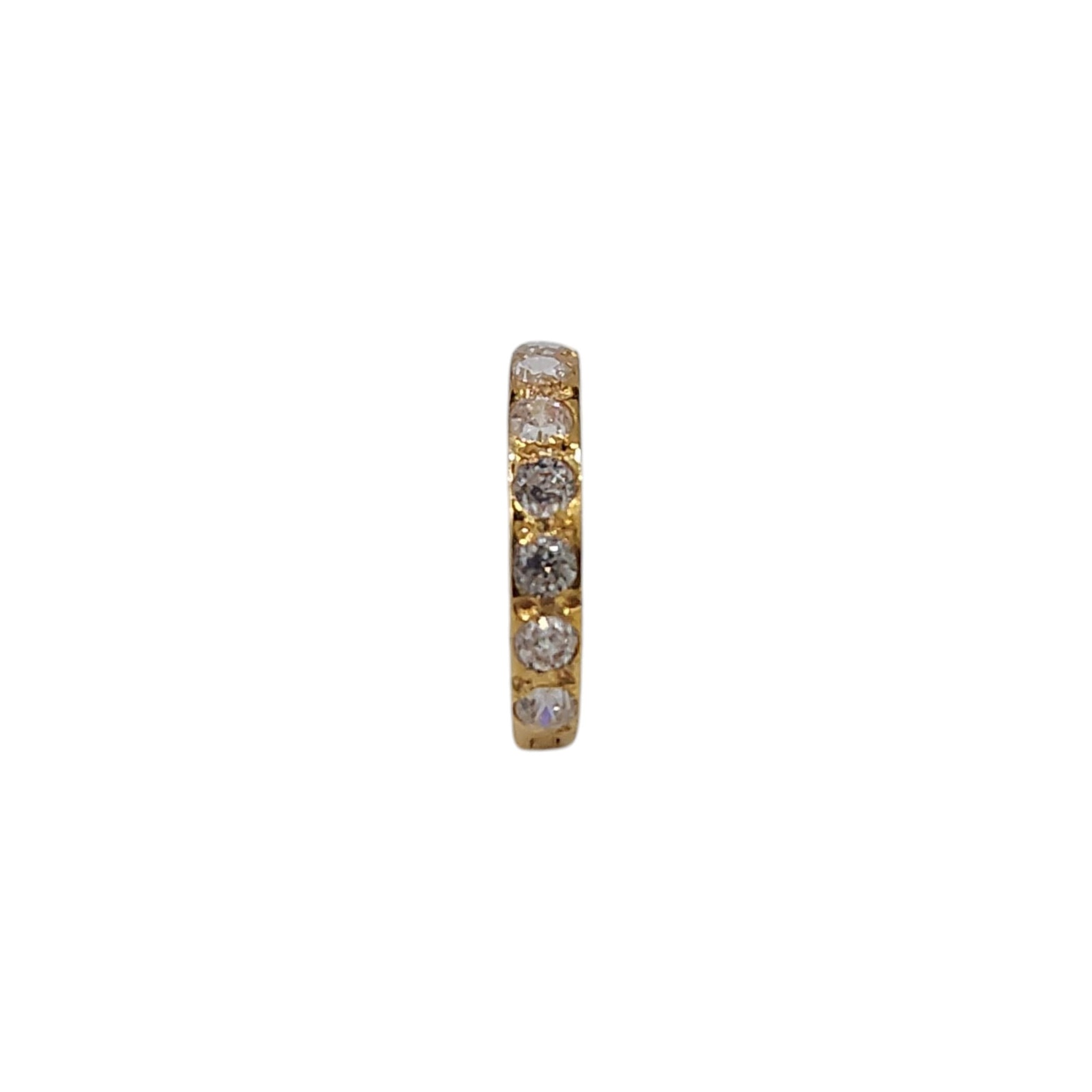 Side view of Regalia Aura gold nose ring with sparkling white stones set in a sleek gold band