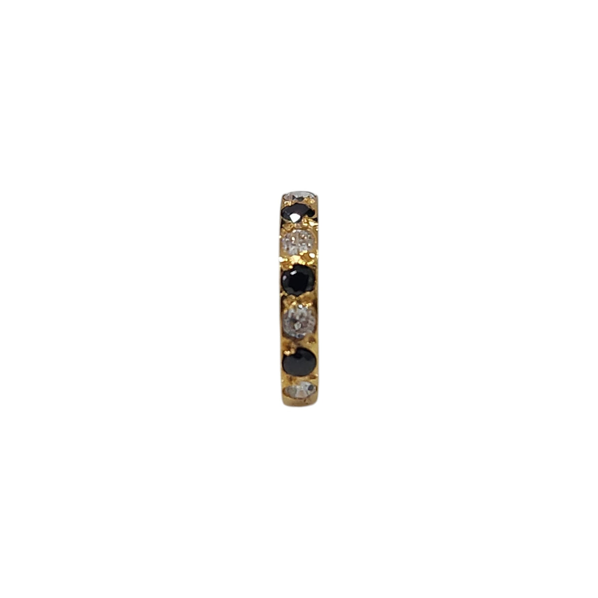 Regalia Aura gold nose ring featuring alternating black and white stones in a vertical close-up view