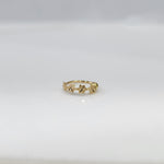 Stars Prism gold nose ring crafted in 18K gold with star-shaped pattern, elegant and minimal design displayed on plain background