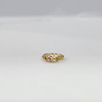 Twist Blossom Gold Nose Ring in 18K gold with floral and twisted vine design placed on a white background by Yuvora