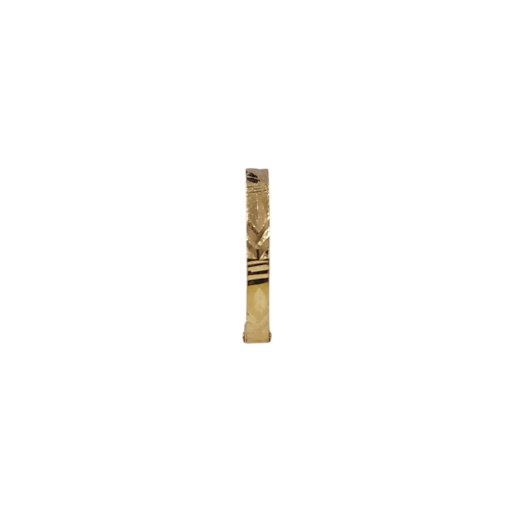 Side profile view of Viva Mosaic gold nose pin in 18K gold with intricate geometric detailing